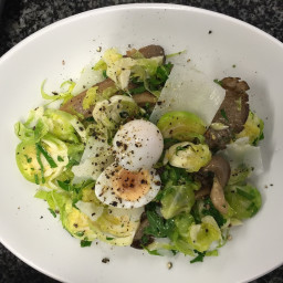 Raw Brussels sprouts with oyster mushrooms and quail eggs