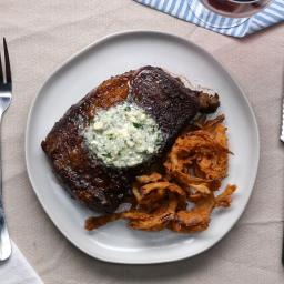 Rib Eye Steak With Blue Cheese Compound Butter And Crispy Onion Strings Rec