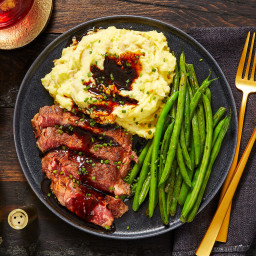 Ribeye and Roasted Garlic Pan Sauce with Mashed Potatoes and Green Beans