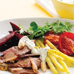 Roast lamb and vegetable plate with mint and yoghurt sauce