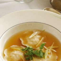 Seafood ravioli in gingery soup