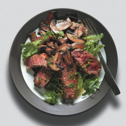 seared-asian-steak-and-mushrooms-on-mixed-greens-with-ginger-dressing-1317574.jpg