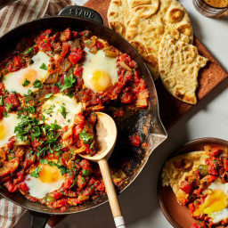 shakshuka-tomato-pepper-stew-with-poached-eggs-and-harissa-3086625.jpg