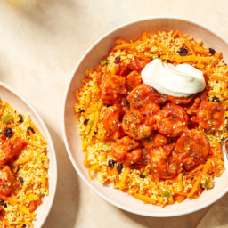 Shrimp in Smoky Harissa Sauce with Couscous, Olives, & Currants