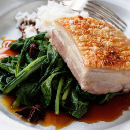 Slow-cooked pork belly on braised Asian greens