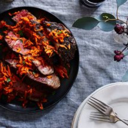 Slow-Cooked Rib Eye Topped with Spicy Harissa Carrots