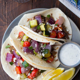 Slow cooker beef tacos with roasted vegetables and feta