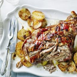 Slow roast shoulder of lamb with sliced potatoes
