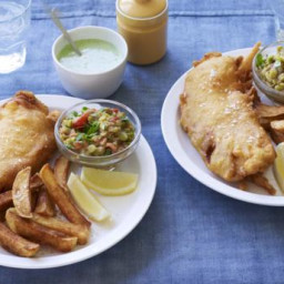 Spiced fish and proper chips with coriander chutney and curried peas