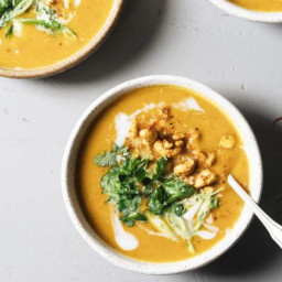 Spiced pumpkin soup with ginger, red curry paste and crunchy roast cashews