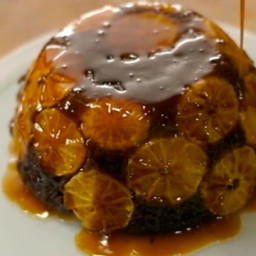 Steamed chocolate and clementine sponge with orange sauce