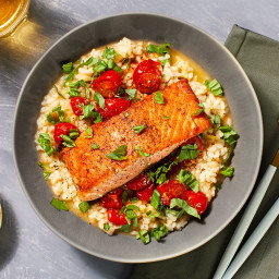 Steelhead Trout over Basil Parm Risotto with Burst Tomatoes