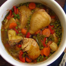 Stewed chicken with peas, carrot and peppers