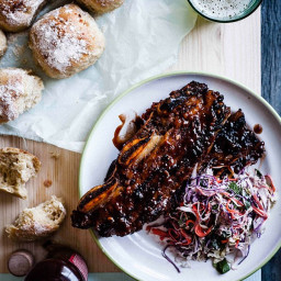 Sticky barbecue beef ribs with coleslaw and soft onion rolls