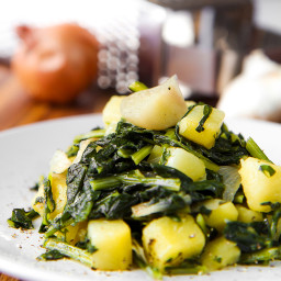 STIR FRIED DANDELIONS AND POTATOES with cheese