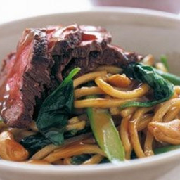 Stir-fried noodles with beef and greens