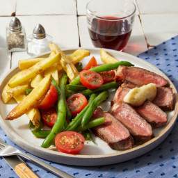 Strip Steaks & Garlic Butter with Oven Fries & Tomato-Green Bean Sa