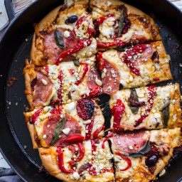 Sun-Dried Tomato and Olive Pesto Pizza with Salami + Roasted Red Peppers.