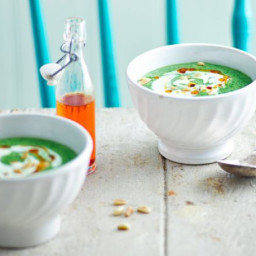 Supergreen soup with yogurt and pine nuts
