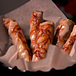 Sweet pastry cigars with almond and cinnamon filling