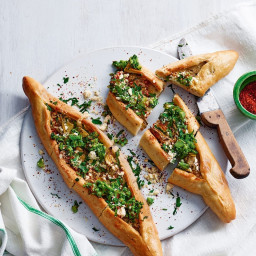 Turkish pide with marinated artichokes, broccoli and cheese