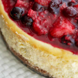 Vanilla Bean Cheesecake with Mixed Berry Compote