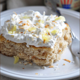 Vanilla Float Cake with Pineapple Whipped Cream and Toasted Coconut