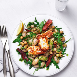 Warm pesto, chickpea and butter bean salad with bacon and grilled halloumi