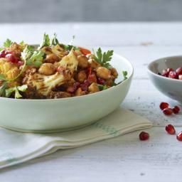 Warm spiced cauliflower and chickpea salad with pomegranate seeds
