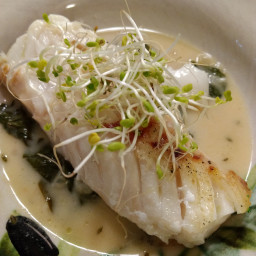 Cod in White Wine and Coconut Milk with wilted Spinach