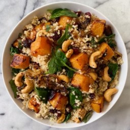 Winter Quinoa Salad with Roasted Squash, Caramelized Onions and Wilted Spin