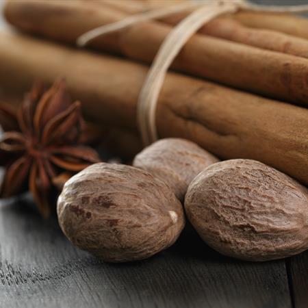 cinnamon nutmeg and star anise on countertop