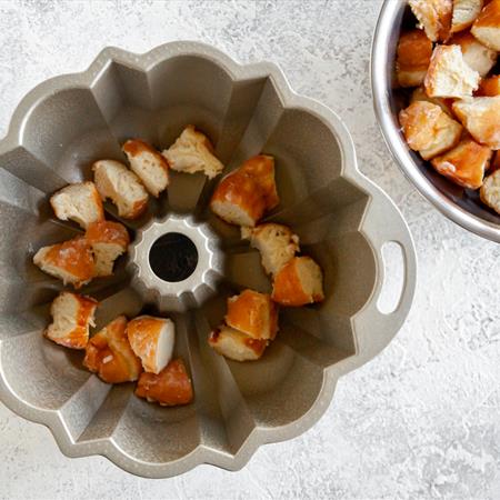 doughnuts in bundt pan on cutting board from overhead