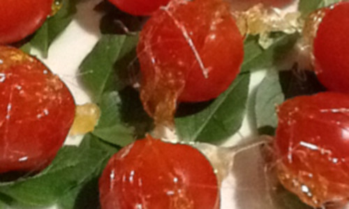 Candied Tomatoes on Basil Leaves